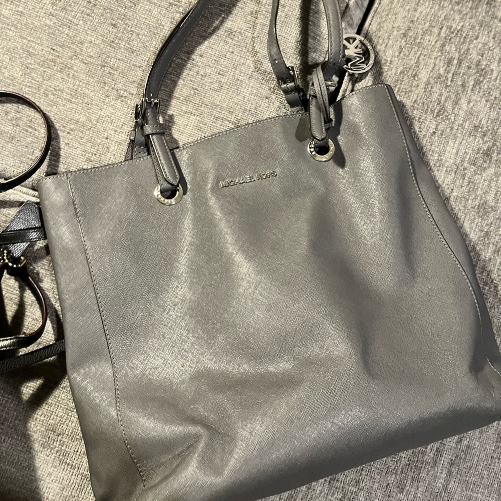 Michael Kors bag! I love this bag but, I never use it anymore.